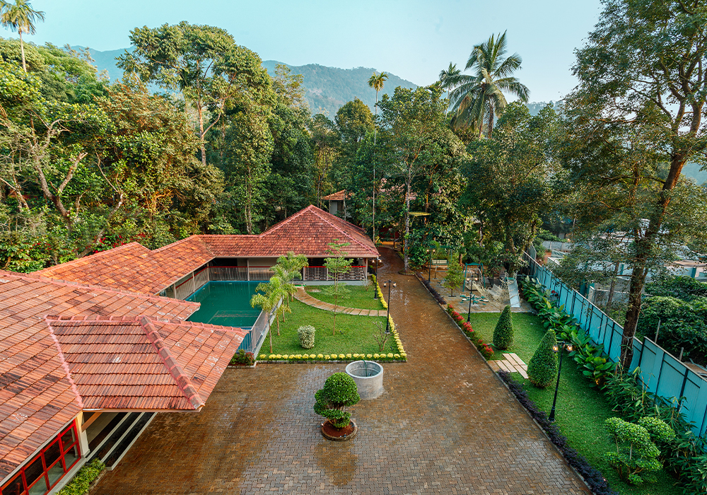 Garden view suite at Vynza Resort Wayanad surrounded by greenery